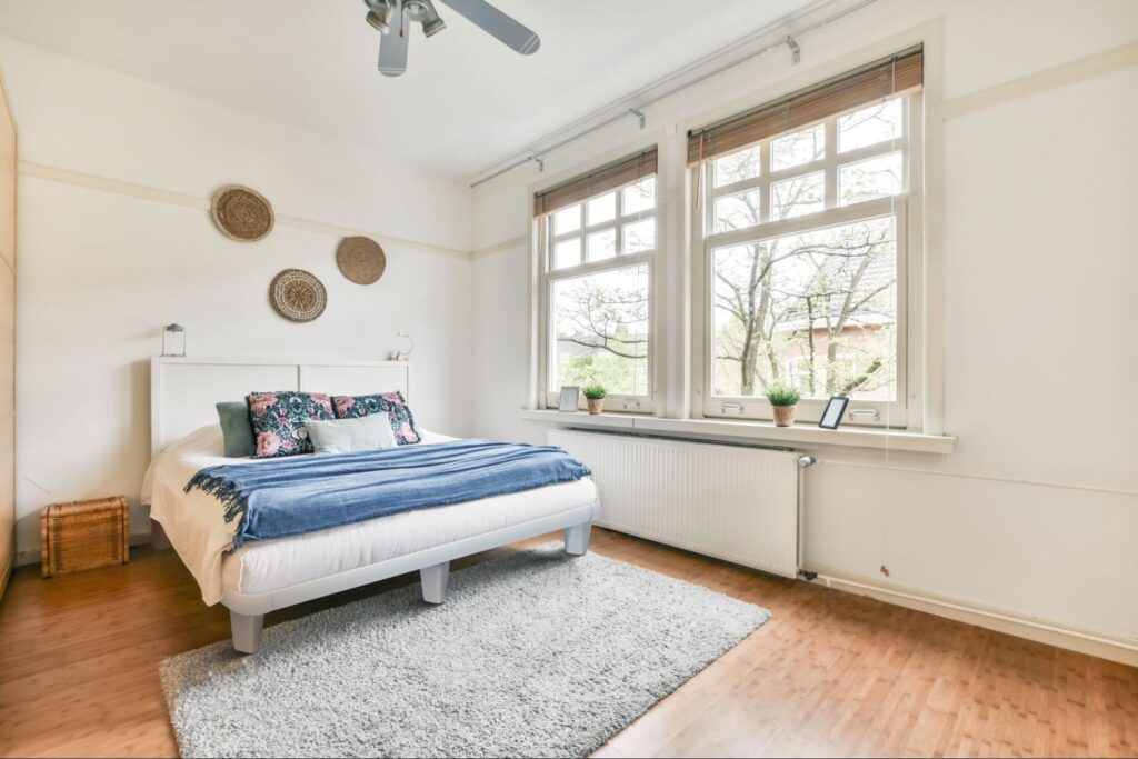 A spacious, organized bedroom with an Easy-to-Assemble Bed for Parents with Toddlers